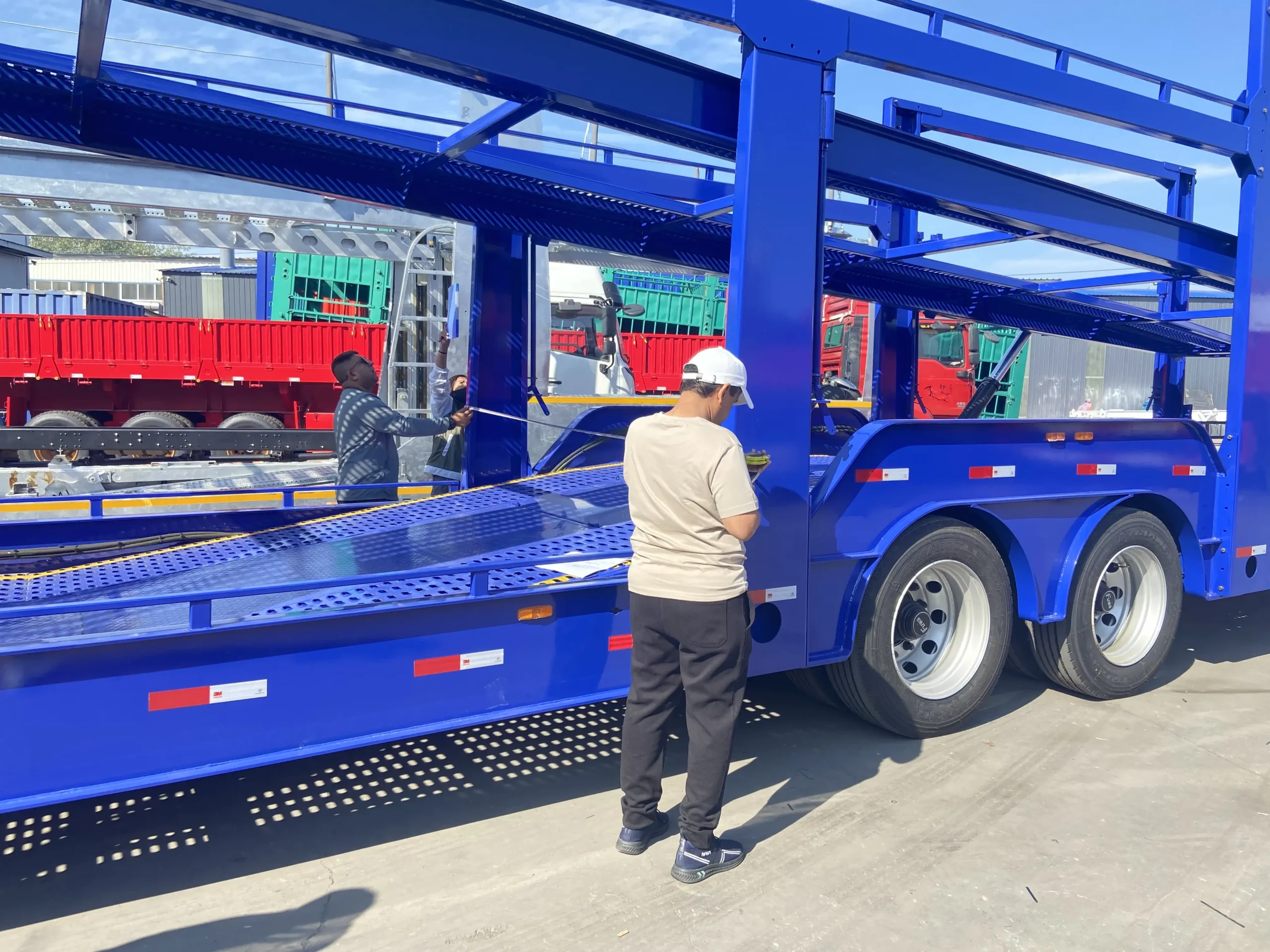 Rear drive-on ramps of the double-deck car carrier trailer
