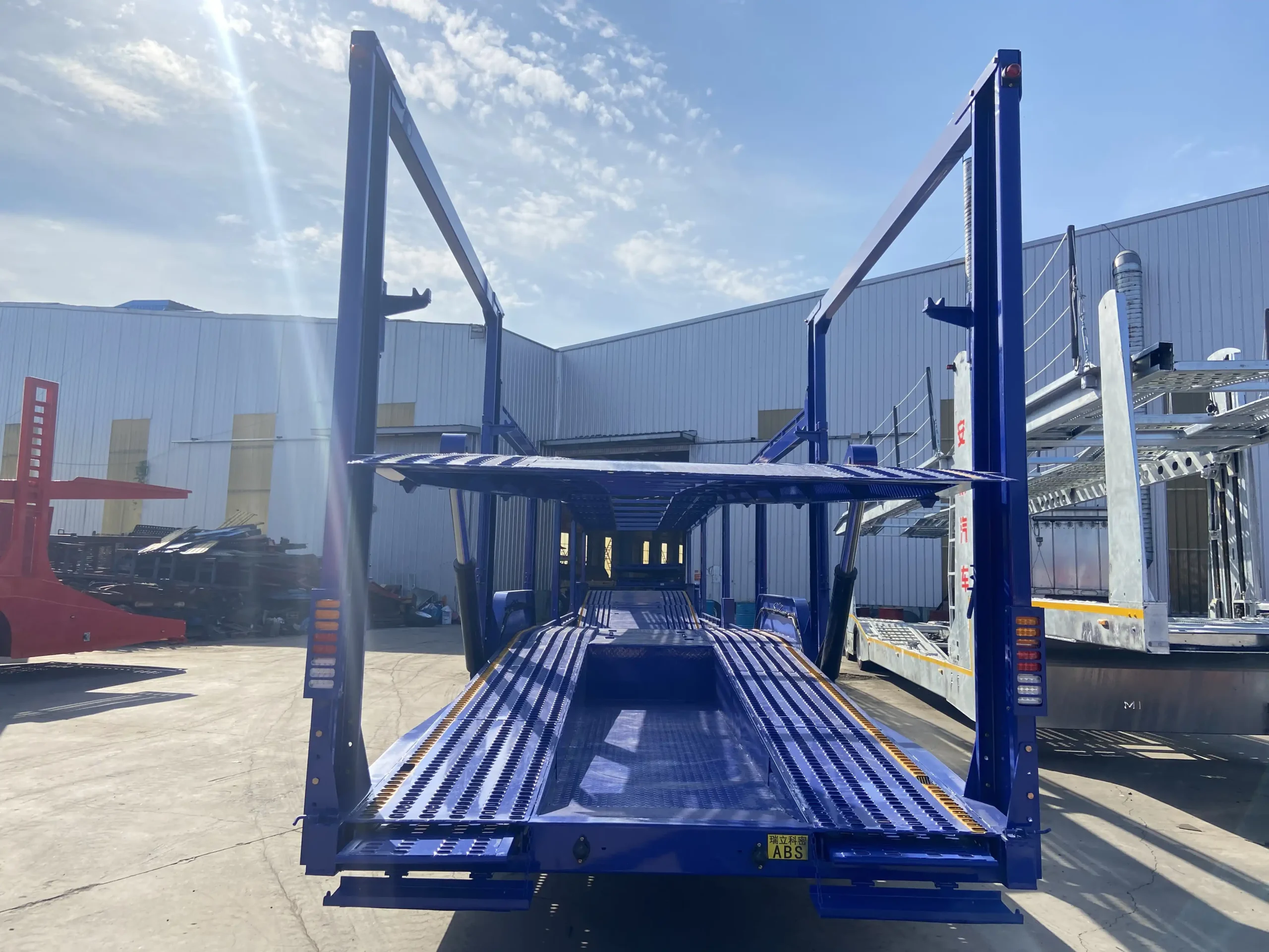 Car carrier trailer rear loading ramps