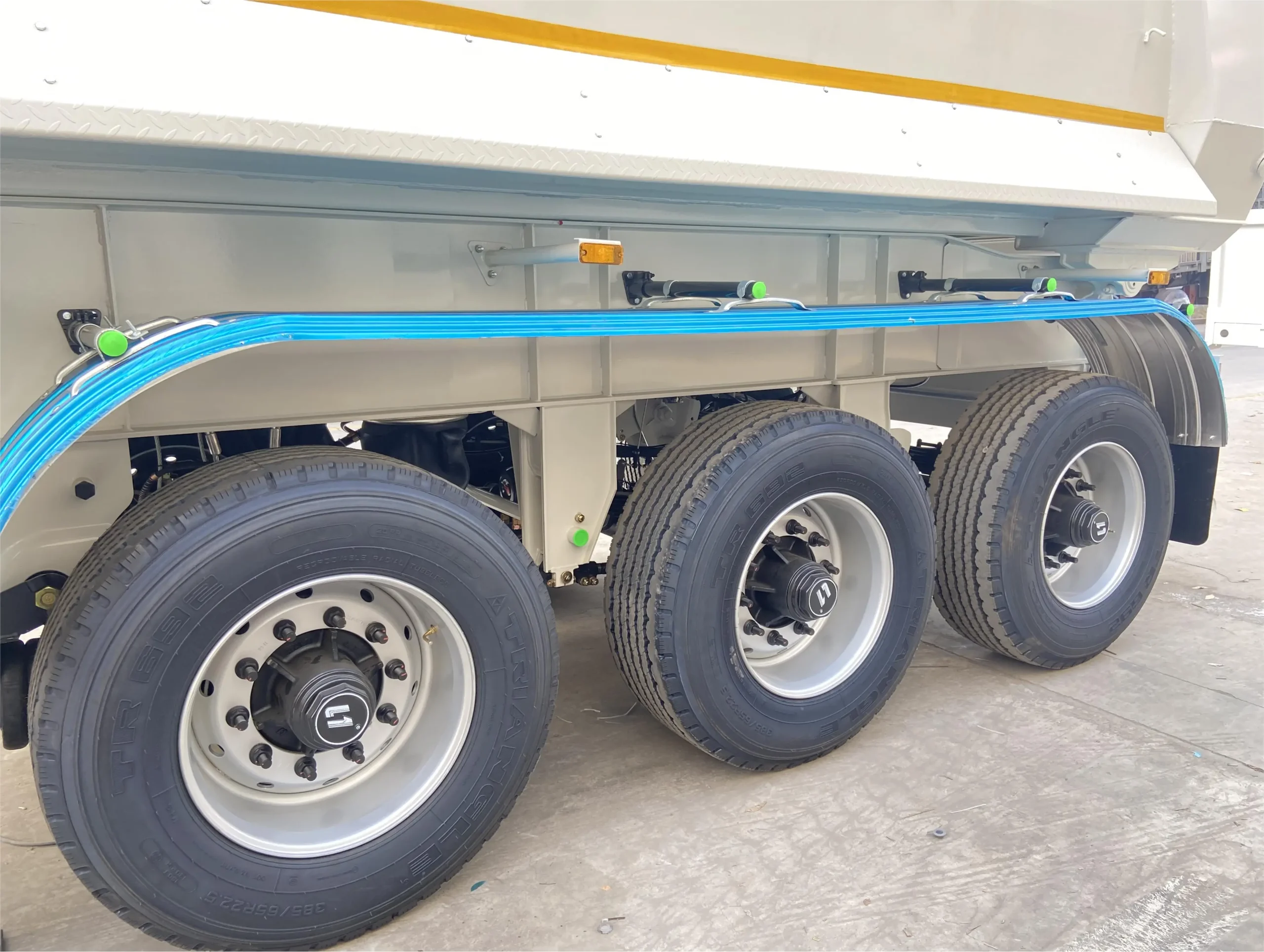 Side ladder and spare wheel of the rear tipper semi trailer