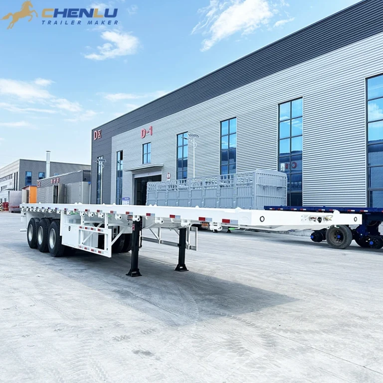 White flatbed semi-trailer chassis in the factory yard