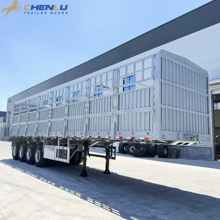 White fence cargo semi-trailer in the factory yard