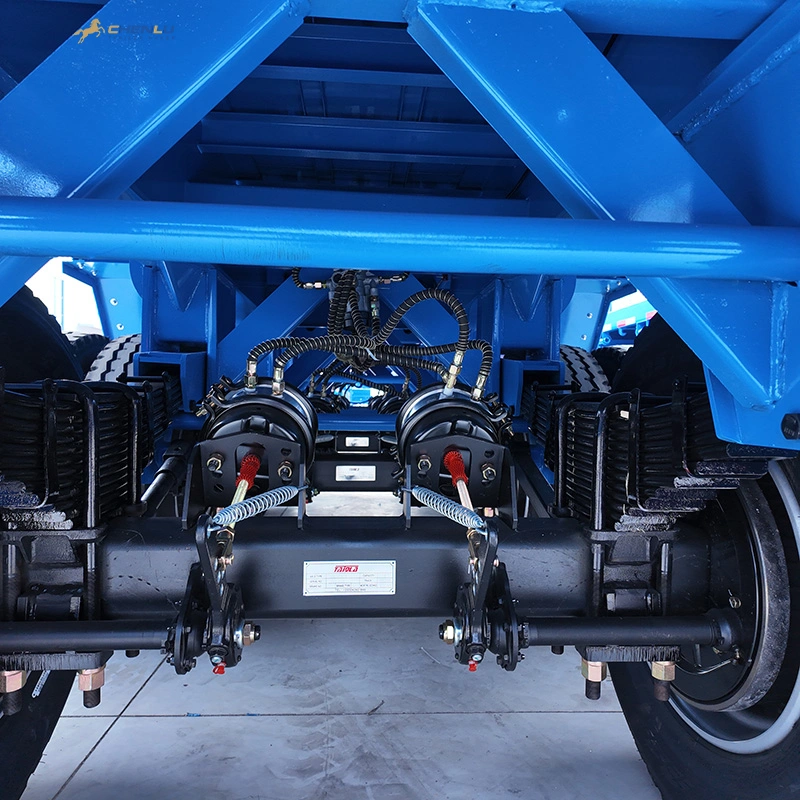 Chassis suspension details on a four axle aluminum flatbed semi trailer