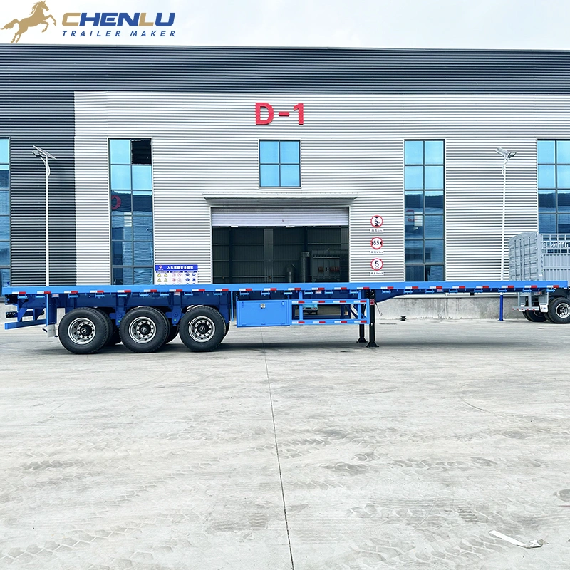 Side view of heavy-duty open-deck flatbed trailer