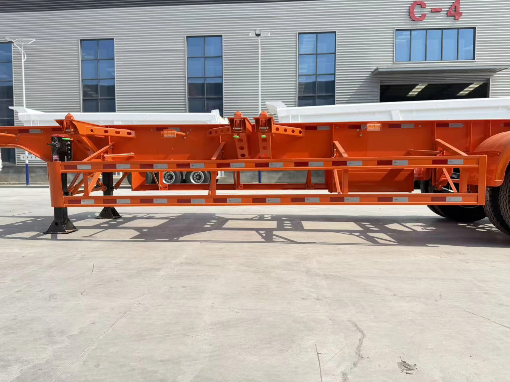 Front three-quarter view of the two-axle skeleton trailer