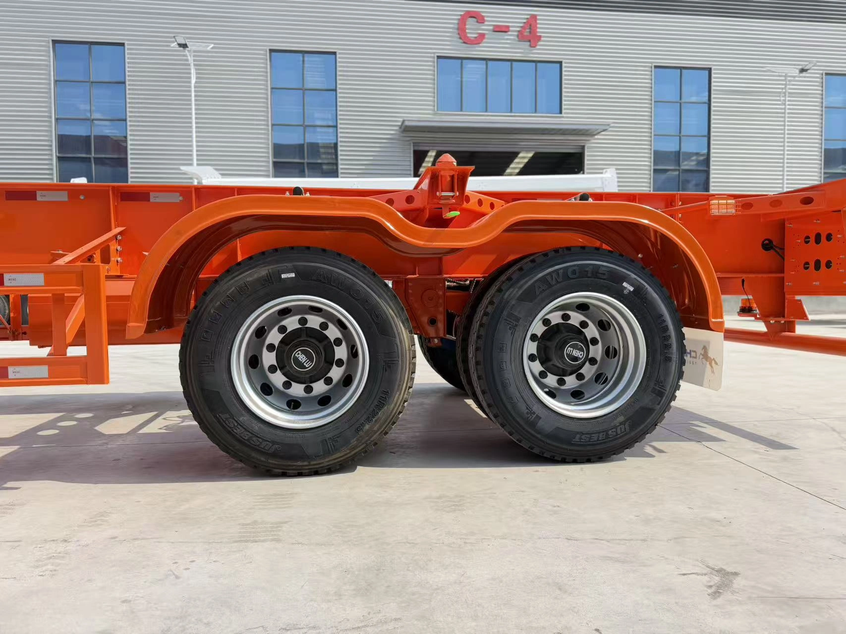 Side view of the two-axle skeleton trailer
