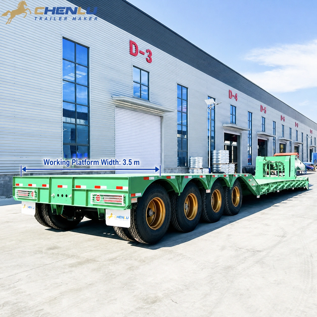 Rear three-quarter view of a four-axle RGN trailer showing the deck and rear axle group
