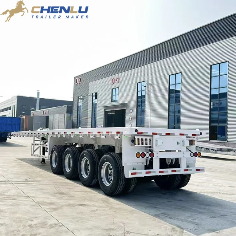 White four-axle flatbed semi-trailer