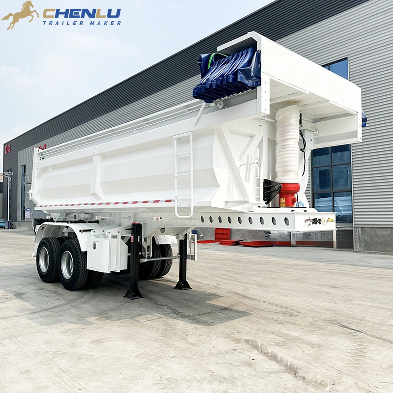 Folded blue cover component on two axle end dump trailer