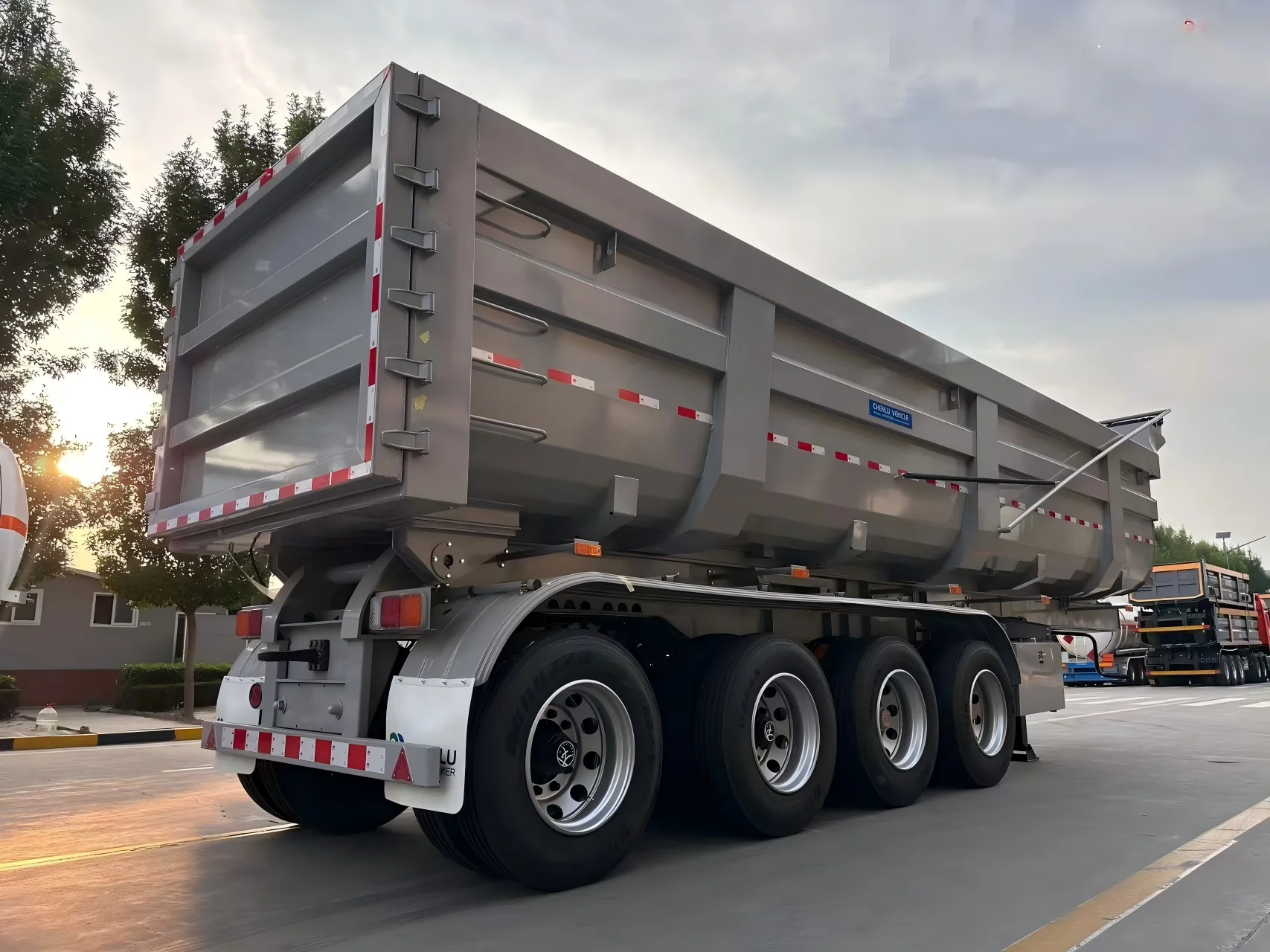 Front view of the four-axle end dump semi trailer