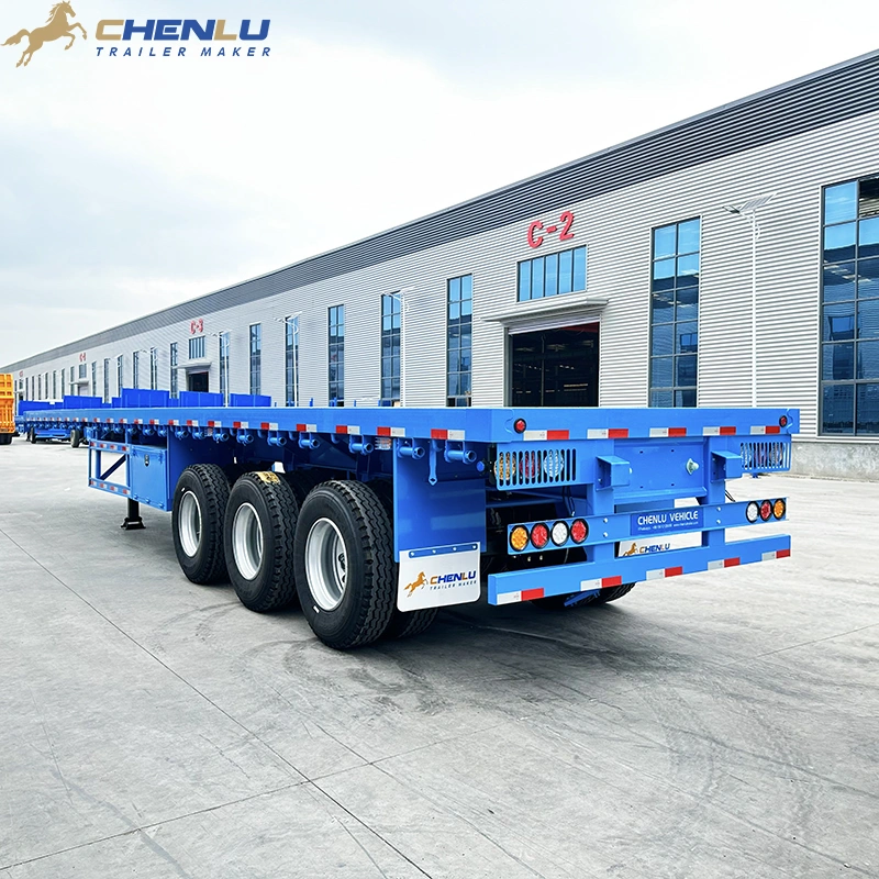 Open deck on heavy-duty tri-axle flatbed trailer