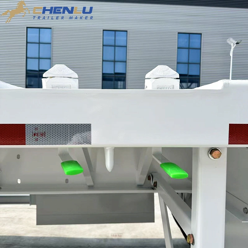 Deck-edge equipment on a 4 axle flatbed semi trailer