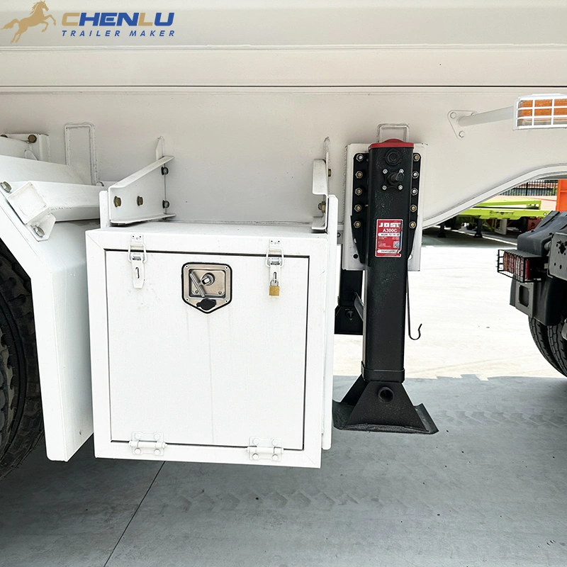 Landing gear spare wheel storage box ladder lights and markings on dump semi trailer