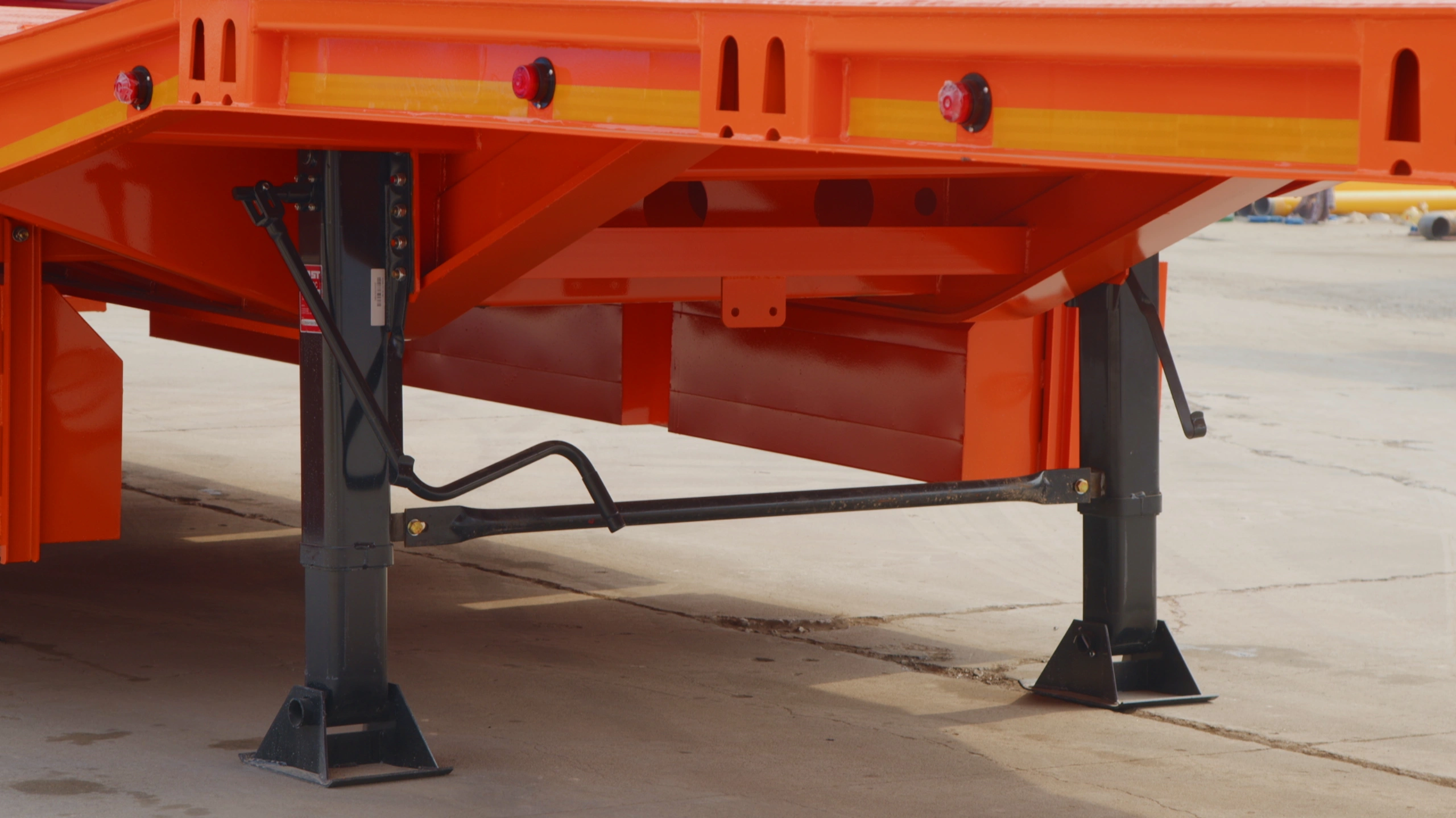 Support stand detail on the three-axle lowbed semi trailer
