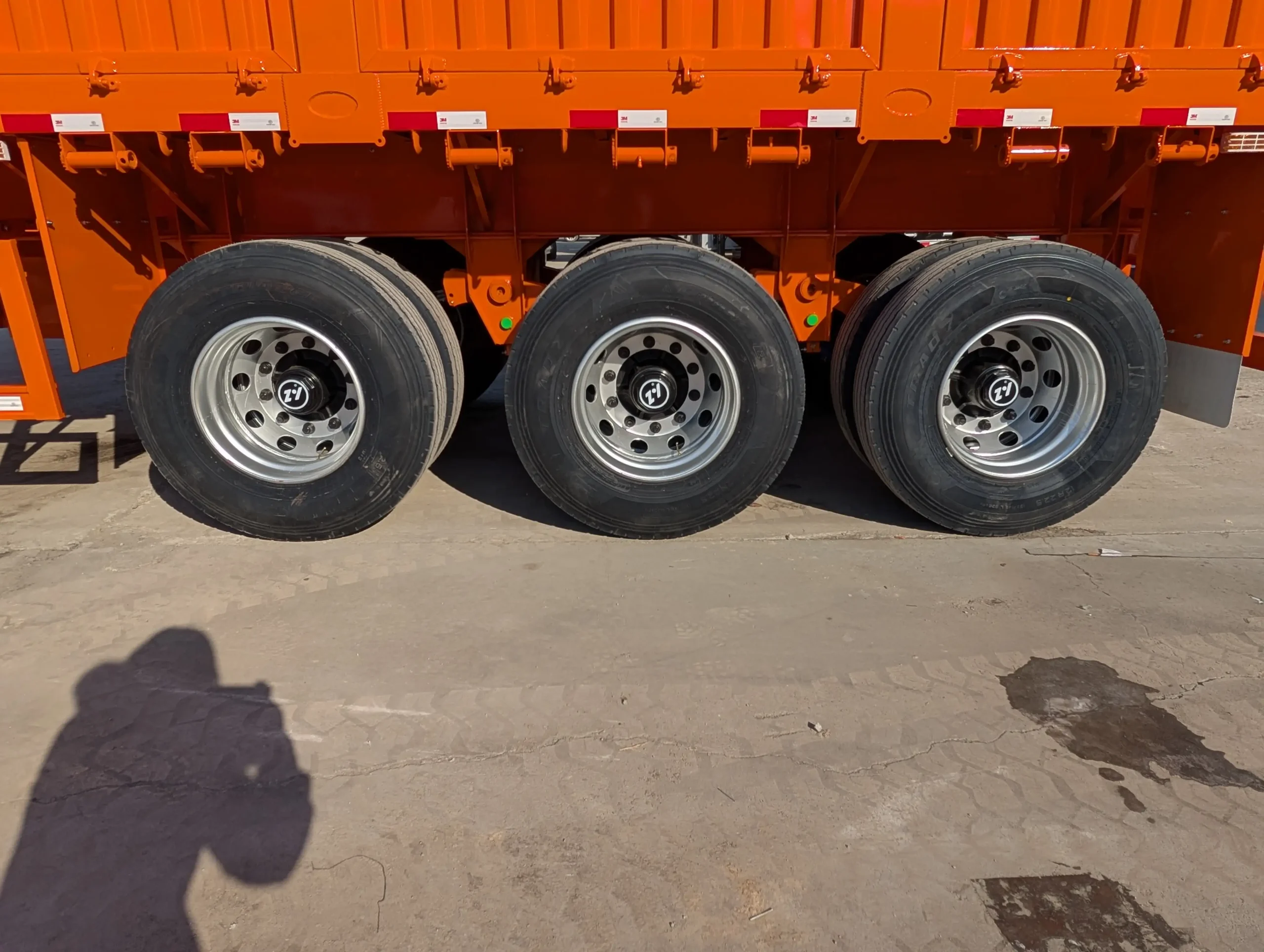 Side protection on three axle fence cargo trailer