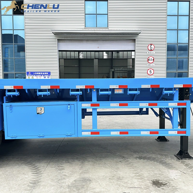 Underdeck toolbox and side equipment on a stake flatbed trailer