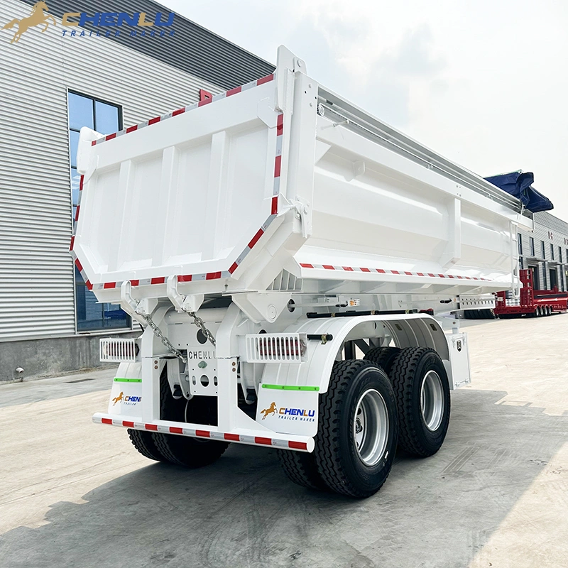 Rear three-quarter view of tandem axle end dump trailer