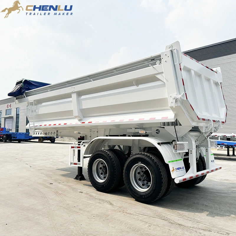 White two-axle end dump semi-trailer with a folded cover at the front