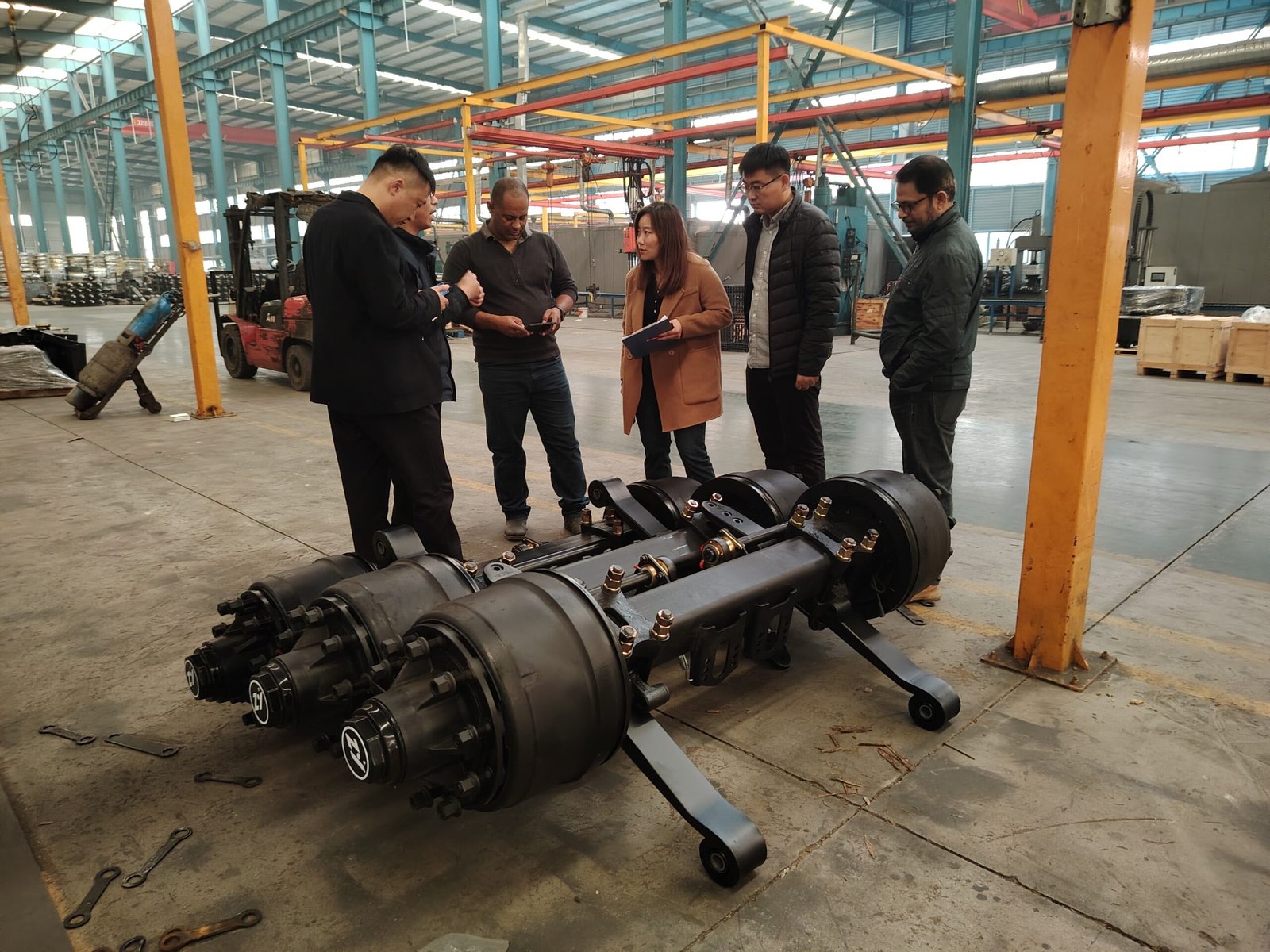 Business partner reviewing trailer production