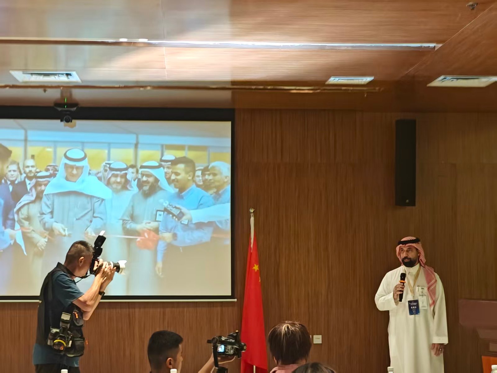 Speaker addressing attendees in the conference room