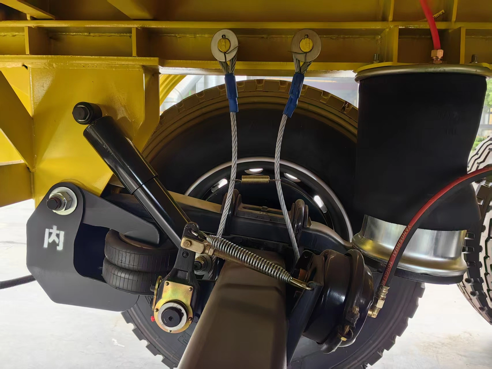 German-style semi-trailer suspension assembly