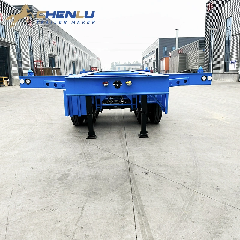 Front container support beam and corner twist locks on the blue skeleton semi trailer