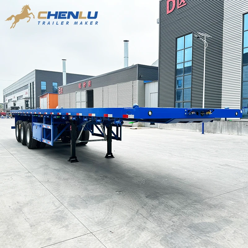 Blue three-axle flatbed semi trailer outside the CHENLU workshop