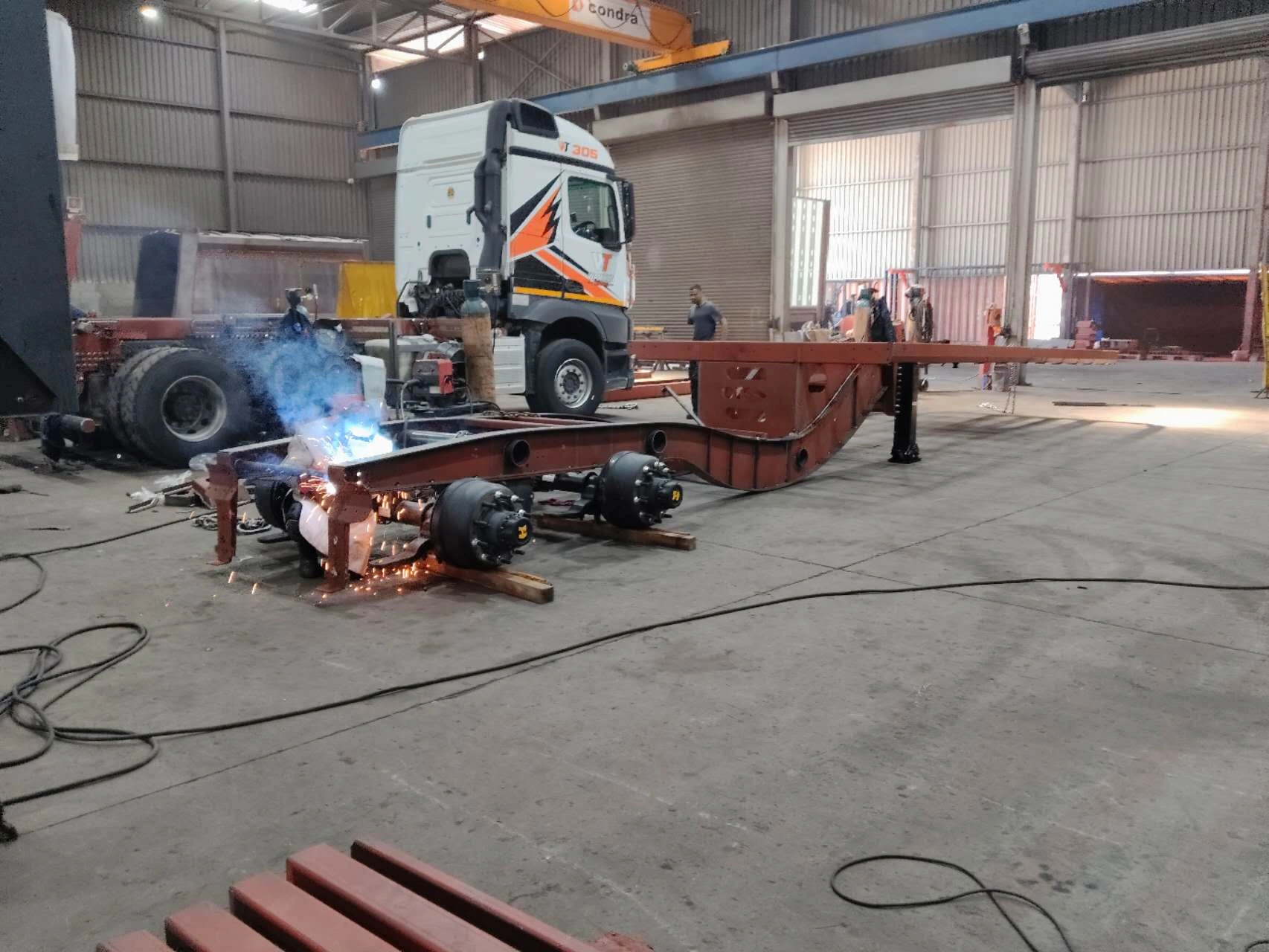 CHENLU team visiting a semi-trailer manufacturing workshop in East Africa