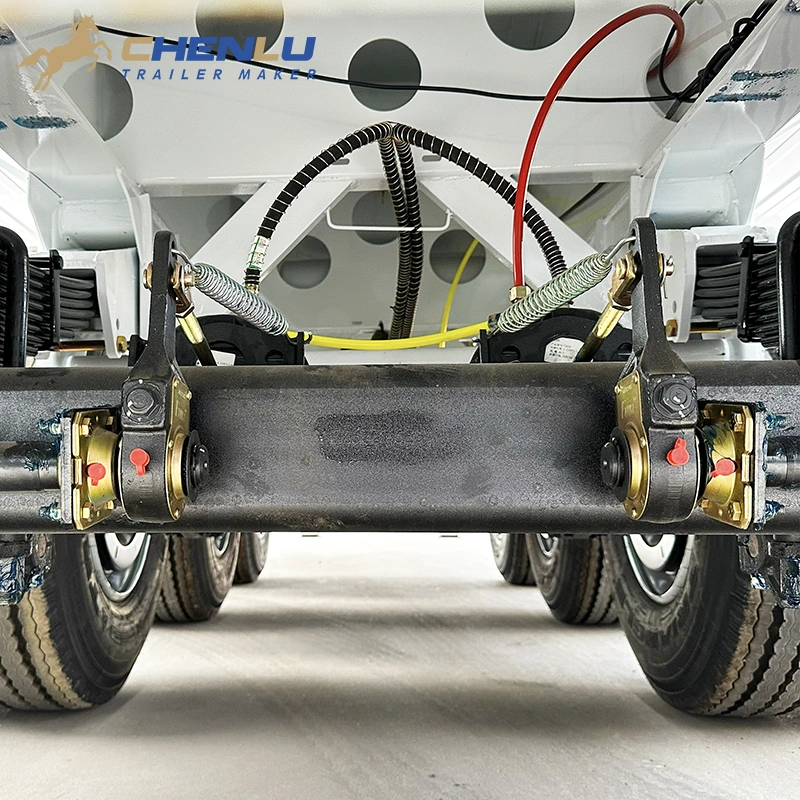 Four-axle suspension group beneath the rear of the cement tanker