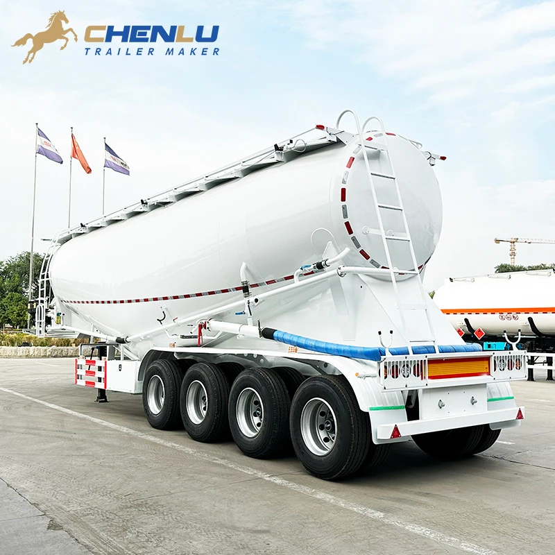 Rear three-quarter view of the white cement tanker