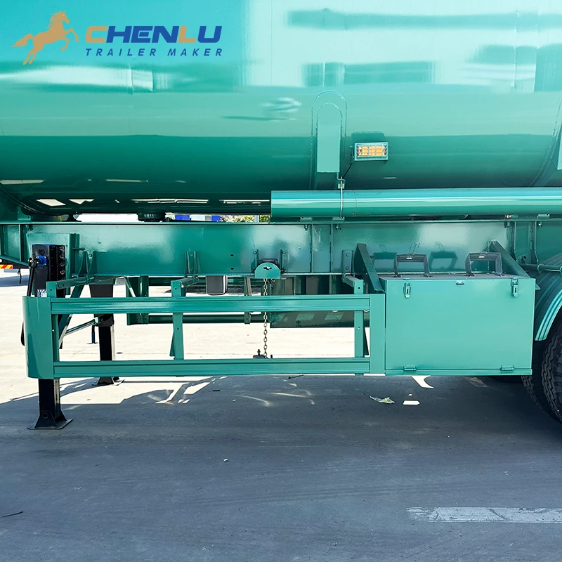 Toolbox and side guard fitted below the green fuel tanker trailer