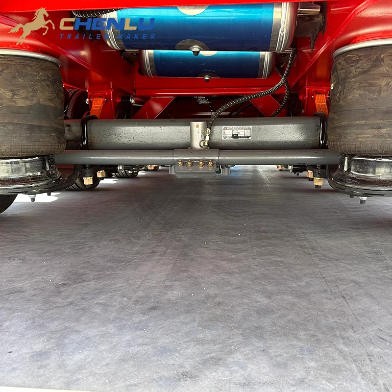 Air tanks and components installed between the lowbed trailer axles