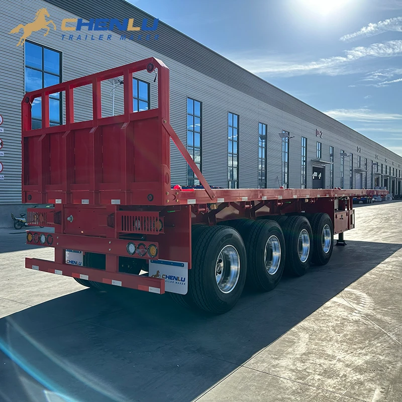 Rear three-quarter view of the four-axle flatbed trailer
