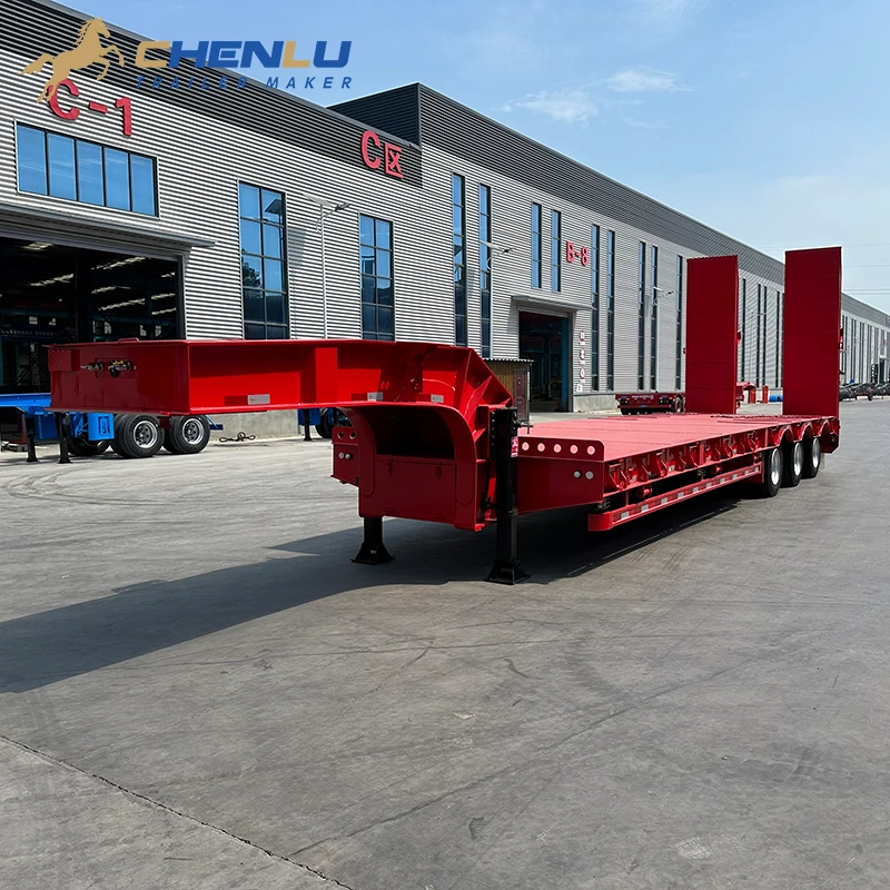 Red 60-tonne three-axle lowbed trailer with a fixed gooseneck and rear loading ramps
