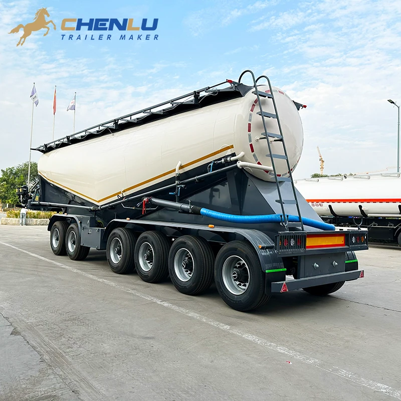 Rear of the powder tanker with blue flexible hose, lower pipework and tank access ladder