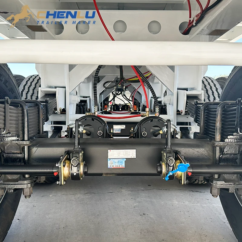 Mechanical leaf-spring suspension below the trailer