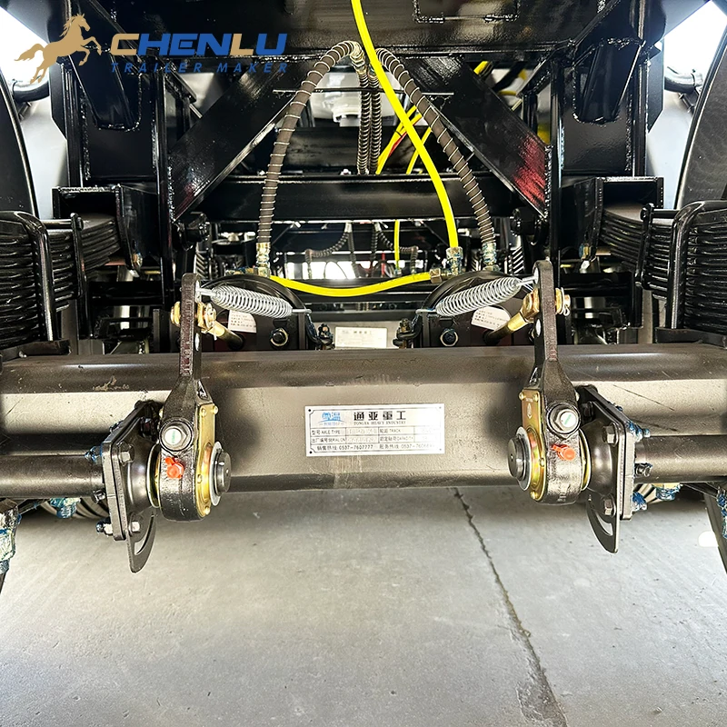 Mechanical leaf-spring suspension and brake components on the fuel tanker trailer