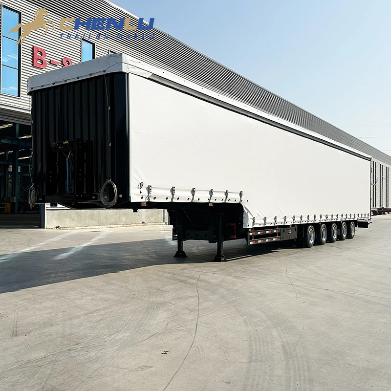 White 16.5 metre five-axle curtainsider semi-trailer viewed from the front quarter