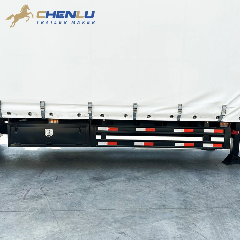 Lockable side toolbox mounted below the curtain body beside the side guard