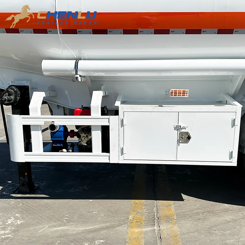 Long capped hose storage tube above the side toolbox of the fuel tanker trailer